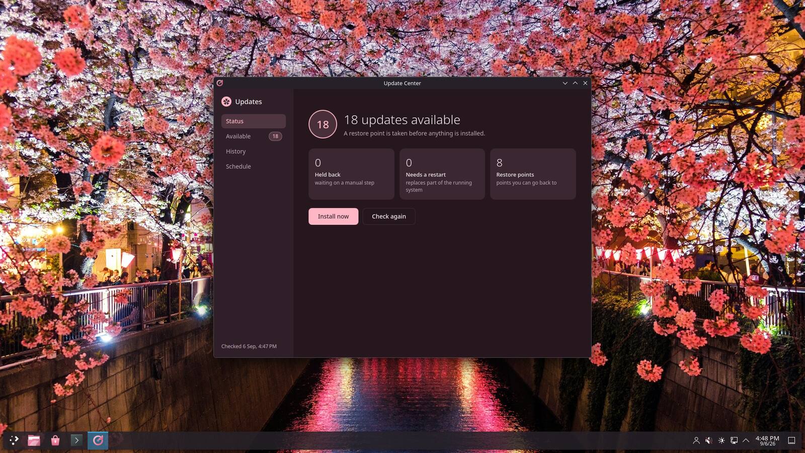 The SakuraOS desktop with the Update Center open